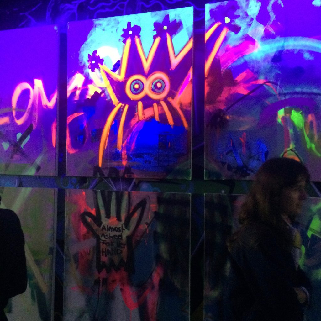 Graffiti art glowing in the dark at Stadtrevue, Cologne