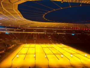 View inside the Bayarena with floodlights on the pitch