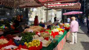 Aachen market place with fresh fruit for sale