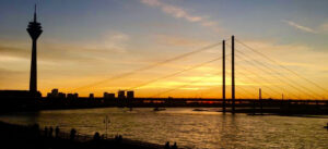 Sunset over the Rhine in Düsseldorf with Rhine tower and bridge