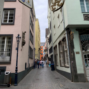 Tour group walks through the old town Cologne
