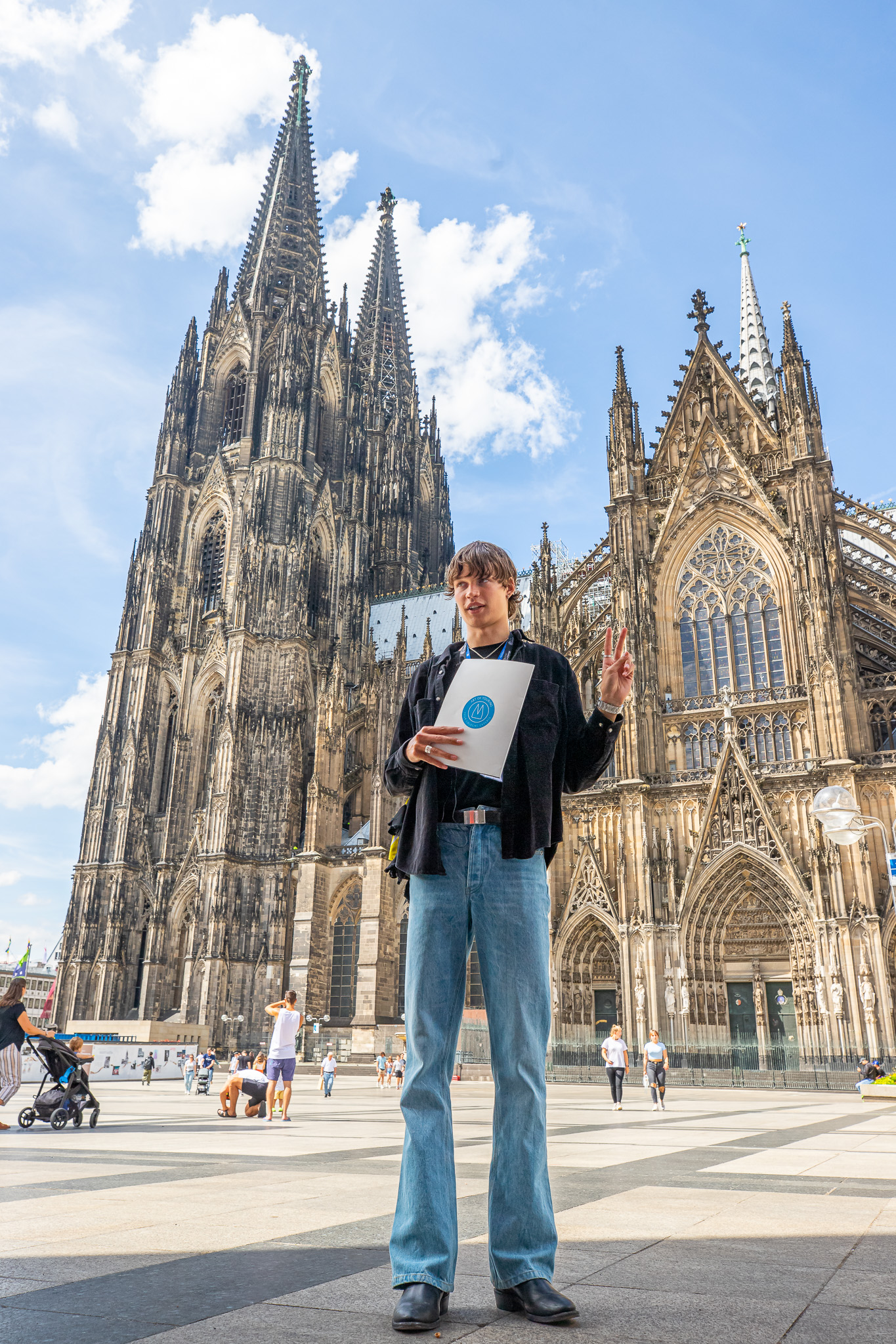 Artur AOT Tour Guide Cologne Germany-23 Walking tour group stands outside the main entrance of the Cologne Cathedral